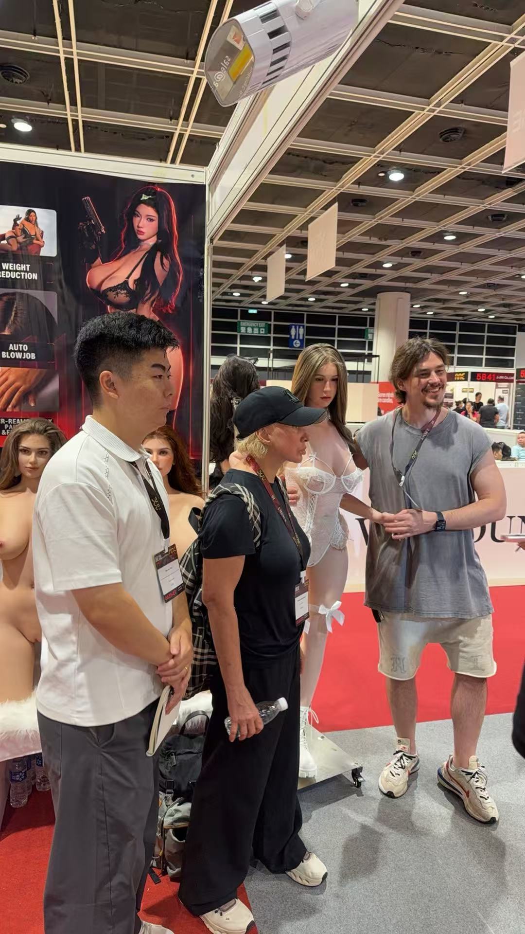 AZMDOLL team speaking with international visitors at AAE 2026 Hong Kong